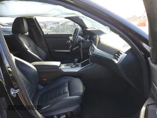 2021 BMW 3 Series 330i z VIN 3MW5R1J05M8B84800, wystawiony jako IAAI lot #41818906 z przebiegiem Nie podano mil oraz . Historia ofert i sprzedaży dostępna na DreamBid. Obrazek 5.