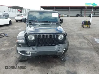 2021 Jeep Gladiator Sport S with VIN 1C6JJTAM3ML546307, listed as a IAAI auction lot 42635138 with Not provided miles and . Bid and sale history available at DreamBid. Image 13.