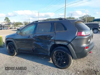 2019 Jeep Cherokee Trailhawk with VIN 1C4PJMBX3KD246100, listed as a IAAI auction lot 41191581 with 98,124 mi miles and . Bid and sale history available at DreamBid. Image 14.
