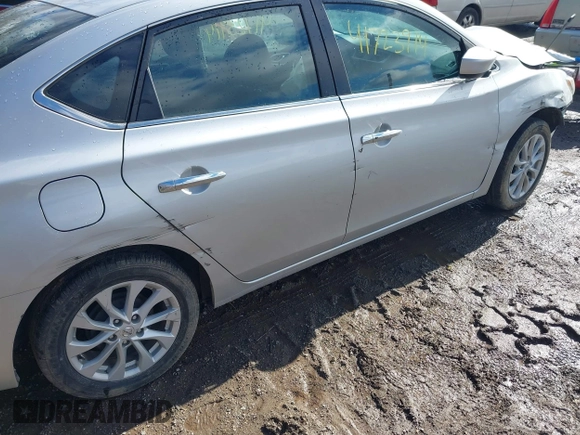 2019 Nissan Sentra S z VIN 3N1AB7APXKY372220, wystawiony jako IAAI lot #41723914 z przebiegiem 103 308 mil mil oraz . Historia ofert i sprzedaży dostępna na DreamBid. Obrazek 17.