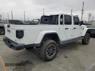 2023 Jeep Gladiator Overland z VIN 1C6HJTFG6PL516742, wystawiony jako Copart lot #65762465 z przebiegiem Nie podano mil oraz Szkoda całkowita • Salvage title. Historia ofert i sprzedaży dostępna na DreamBid. Obrazek 3.