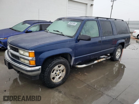 1996 Chevrolet Suburban z VIN 3GNFK16RXTG125871, wystawiony jako Copart lot #86401384 z przebiegiem 220 767 mil mil oraz Czysty tytuł • Clean title. Historia ofert i sprzedaży dostępna na DreamBid. Obrazek 1.