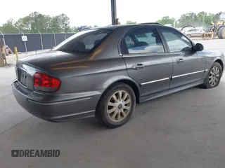 2004 Hyundai Sonata GLS with VIN KMHWF35H64A957365, listed as a IAAI auction lot 42150369 with 247,348 mi miles. Bid and sale history available at carsss.com. Image 4.