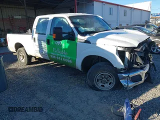 2015 Ford Super Duty F-250 SRW Lariat with VIN 1FT7W2B68FEA26013, listed as a IAAI auction lot 41528281 with 166,947 mi miles. Bid and sale history available at carsss.com. Image 1.