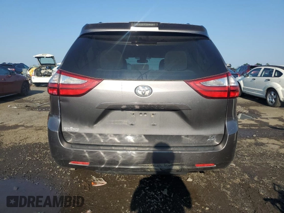 2018 Toyota Sienna LE with VIN 5TDJZ3DC3JS203625, listed as a Copart auction lot 61287235 with 98,183 mi miles and Salvage title. Bid and sale history available at DreamBid. Image 6.