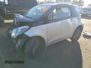 2014 Scion iQ with VIN JTNJJXB04EJ028369, listed as a Copart auction lot 84030864 with 0 mi miles and Salvage Title. Bid and sale history available at carsss.com. Image 1.