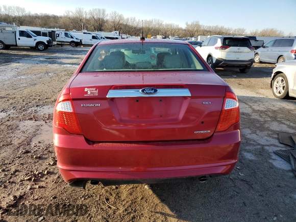 2012 Ford Fusion SEL with VIN 3FAHP0JG1CR265885, listed as a Copart auction lot 48516675 with 142,258 mi miles and Salvage Title. Bid and sale history available at DreamBid. Image 6.