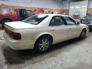 2004 Cadillac Seville Luxury SLS z VIN 1G6KS54Y24U168062, wystawiony jako Copart lot #84865574 z przebiegiem 240 052 mil mil oraz Tytuł czysty. Historia ofert i sprzedaży dostępna na DreamBid. Obrazek 3.