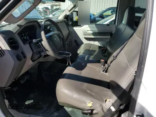 2010 Ford F-250 with VIN 1FTNF2A53AEB12824, listed as a Copart auction lot 81933704 with 210,425 mi miles and Salvage title. Bid and sale history available at DreamBid. Image 7.