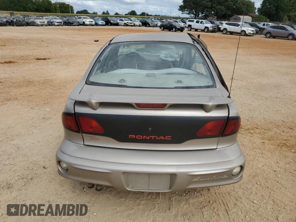 2002 Pontiac Sunfire SE z VIN 1G2JB524027308408, wystawiony jako Copart lot #61752784 z przebiegiem Nie podano mil oraz Szkoda całkowita • Salvage title. Historia ofert i sprzedaży dostępna na DreamBid. Obrazek 6.
