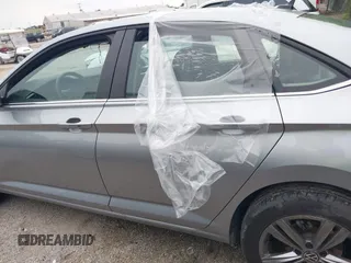 2024 Volkswagen Jetta SE z VIN 3VWEM7BU9RM083387, wystawiony jako IAAI lot #42431499 z przebiegiem 32 476 mil mil oraz . Historia ofert i sprzedaży dostępna na DreamBid. Obrazek 13.
