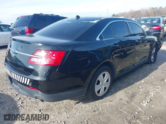 2014 Ford Police Interceptor with VIN 1FAHP2MK0EG148689, listed as a IAAI auction lot 41057241 with 124,703 mi miles and . Bid and sale history available at DreamBid. Image 4.