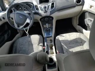 2012 Ford Fiesta SE with VIN 3FADP4BJ9CM159620, listed as a Copart auction lot 48818935 with 127,054 mi miles and Salvage Title. Bid and sale history available at DreamBid. Image 8.