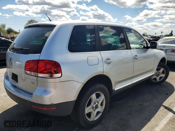 2006 Volkswagen Touareg 3.2L V6 with VIN WVGZG77L76D040164, listed as a Copart auction lot 51551155 with 169,611 mi miles and Salvage Title. Bid and sale history available at DreamBid. Image 3.