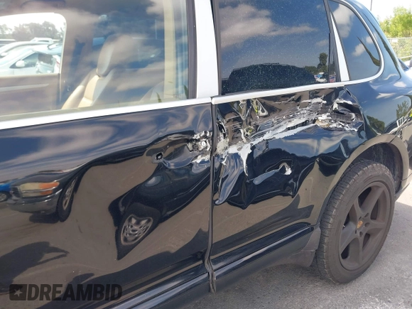 2009 Porsche Cayenne S with VIN WP1AB29P79LA41116, listed as a IAAI auction lot 41874514 with 129,189 mi miles and . Bid and sale history available at DreamBid. Image 17.