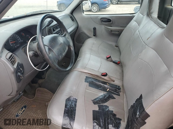 1999 Ford F-150 with VIN 1FTRF17W1XNA20017, listed as a Copart auction lot 84550234 with Not provided miles and Salvage title. Bid and sale history available at DreamBid. Image 7.
