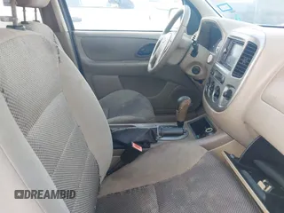 2005 Ford Escape XLT with VIN 1FMYU03145KA40360, listed as a IAAI auction lot 42511276 with 151,269 mi miles and . Bid and sale history available at DreamBid. Image 5.