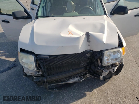 2010 Ford Escape XLS with VIN 1FMCU0C76AKB82752, listed as a Copart auction lot 57626565 with 194,931 mi miles and Salvage title. Bid and sale history available at DreamBid. Image 12.