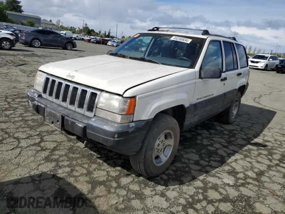 1997 Jeep Grand Cherokee Laredo with VIN 1J4GZ58S8VC647415, listed as a Copart auction lot 49258934 with 0 mi miles and Salvage Title. Bid and sale history available at carsss.com. Image 1.
