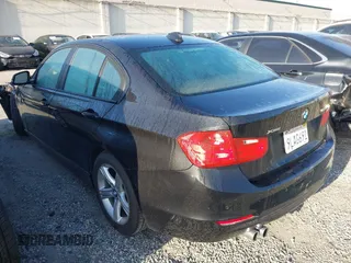 2015 BMW 3 Series 328i xDrive with VIN WBA3B3C57FF547110, listed as a IAAI auction lot 41870141 with 49,412 mi miles and . Bid and sale history available at carsss.com. Image 3.