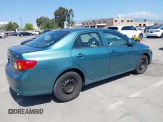 2009 Toyota Corolla with VIN 2T1BU40E29C159363, listed as a IAAI auction lot 42140431 with 147,477 mi miles and . Bid and sale history available at carsss.com. Image 4.