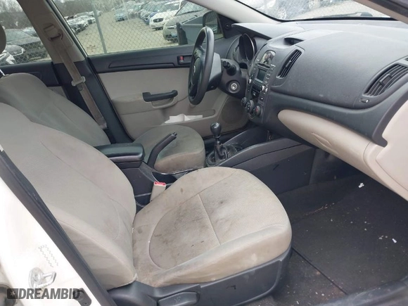 2012 Kia Forte LX with VIN KNAFT4A23C5581443, listed as a IAAI auction lot 41697825 with 115,184 mi miles. Bid and sale history available at carsss.com. Image 5.