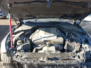 2015 Infiniti Q50 Premium with VIN JN1BV7AP4FM334762, listed as a IAAI auction lot 41443049 with 99,519 mi miles. Bid and sale history available at carsss.com. Image 10.