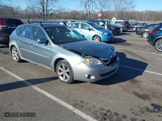 2009 Subaru Impreza Wagon Outback Sport with VIN JF1GH63639H827263, listed as a IAAI auction lot 41643827 with 128,730 mi miles. Bid and sale history available at carsss.com. Image 1.