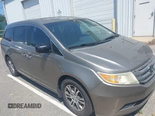 2011 Honda Odyssey EX-L with VIN 5FNRL5H63BB092777, listed as a IAAI auction lot 42596042 with 214,234 mi miles and . Bid and sale history available at DreamBid. Image 1.