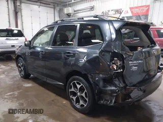 2014 Subaru Forester 2.0XT Touring with VIN JF2SJGPC7EH425711, listed as a IAAI auction lot 41549382 with 119,039 mi miles. Bid and sale history available at carsss.com. Image 3.