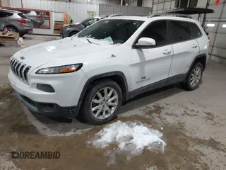 2014 Jeep Cherokee Limited with VIN 1C4PJLDS3EW283569, listed as a IAAI auction lot 41589298 with 128,307 mi miles. Bid and sale history available at carsss.com. Image 2.