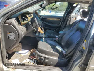2004 Jaguar X-Type with VIN SAJEA51C04WD91344, listed as a Copart auction lot 49979285 with Not Provided miles and Salvage Title. Bid and sale history available at DreamBid. Image 7.
