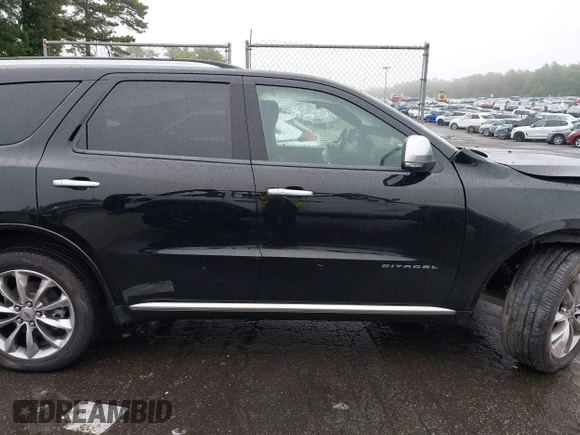 2023 Dodge Durango Citadel with VIN 1C4RDJEG1PC582304, listed as a IAAI auction lot 42528327 with 9,896 mi miles and . Bid and sale history available at DreamBid. Image 14.