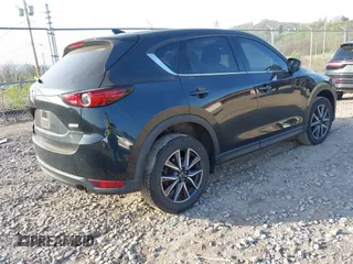 2018 Mazda CX-5 Grand Touring with VIN JM3KFBDM2J0463279, listed as a IAAI auction lot 42115309 with 68,851 mi miles. Bid and sale history available at carsss.com. Image 4.