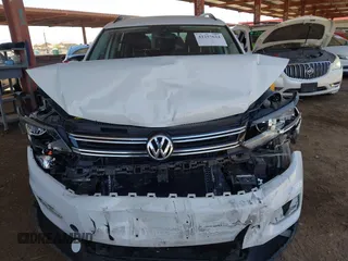 2017 Volkswagen Tiguan S with VIN WVGAV7AXXHK026143, listed as a IAAI auction lot 42257624 with 87,327 mi miles and . Bid and sale history available at DreamBid. Image 6.