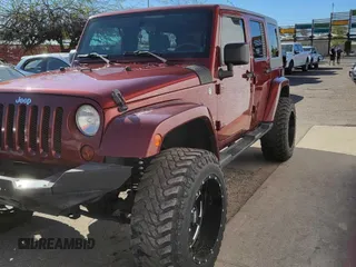 2010 Jeep Wrangler Unlimited Sahara with VIN 1J4BA5H10AL117474, listed as a Copart auction lot 51196435 with 131,256 mi miles and Clean Title. Bid and sale history available at carsss.com. Image 2.