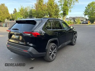 2019 Toyota RAV4 LE with VIN JTMF1RFV4KD030550, listed as a Copart auction lot 55537415 with 92,319 mi miles and Clean Title. Bid and sale history available at DreamBid. Image 4.