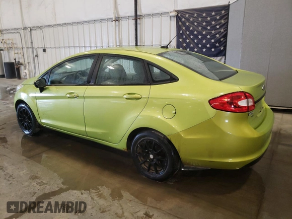 2011 Ford Fiesta SE with VIN 3FADP4BJ2BM153639, listed as a Copart auction lot 50975305 with 128,711 mi miles and Salvage Title. Bid and sale history available at carsss.com. Image 2.
