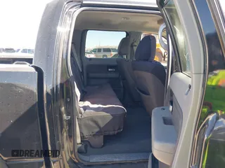 2005 Ford F-150 XLT with VIN 1FTRW12W85KC74796, listed as a IAAI auction lot 41761901 with 235,009 mi miles. Bid and sale history available at carsss.com. Image 8.