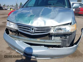 2003 Honda Odyssey EX-L with VIN 5FNRL18973B148675, listed as a IAAI auction lot 41992952 with 232,013 mi miles and . Bid and sale history available at DreamBid. Image 6.