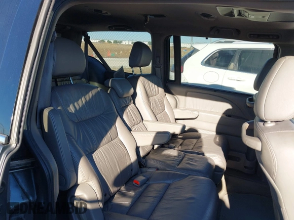 2010 Honda Odyssey EX-L with VIN 5FNRL3H76AB040457, listed as a IAAI auction lot 42214329 with 182,051 mi miles and . Bid and sale history available at carsss.com. Image 8.