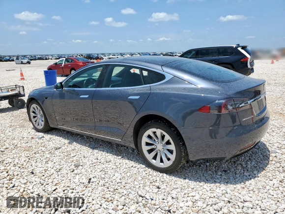 2017 Tesla Model S 60 with VIN 5YJSA1E15HF223354, listed as a Copart auction lot 60064725 with 60,403 mi miles and Salvage title. Bid and sale history available at DreamBid. Image 2.