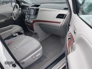 2014 Toyota Sienna XLE with VIN 5TDYK3DC2ES485846, listed as a IAAI auction lot 41693092 with 106,156 mi miles and . Bid and sale history available at DreamBid. Image 5.