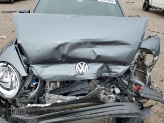 2014 Volkswagen Beetle Entry z VIN 3VWF17AT0EM658329, wystawiony jako Copart lot #55049025 z przebiegiem Nie podano mil oraz Szkoda całkowita • Salvage title. Historia ofert i sprzedaży dostępna na DreamBid. Obrazek 11.