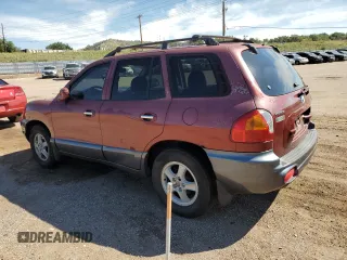 2002 Hyundai Santa Fe GLS with VIN KM8SC73D42U231286, listed as a Copart auction lot 71290624 with 187,534 mi miles and Salvage Title. Bid and sale history available at carsss.com. Image 2.