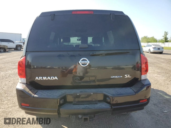 2013 Nissan Armada SL z VIN 5N1BA0ND1DN605912, wystawiony jako Copart lot #53389245 z przebiegiem 165 715 mil mil oraz Szkoda całkowita • Salvage title. Historia ofert i sprzedaży dostępna na DreamBid. Obrazek 6.