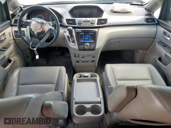 2014 Honda Odyssey Touring with VIN 5FNRL5H97EB037439, listed as a Copart auction lot 62782035 with 153,315 mi miles and Salvage title. Bid and sale history available at DreamBid. Image 8.
