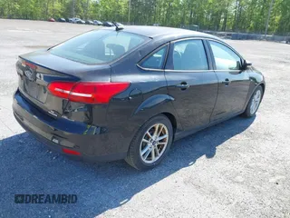 2015 Ford Focus SE with VIN 1FADP3F28FL204176, listed as a IAAI auction lot 42132656 with Not Provided miles. Bid and sale history available at carsss.com. Image 4.