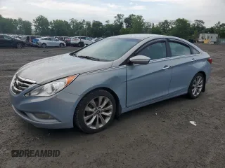 2013 Hyundai Sonata SE z VIN 5NPEC4AC6DH672456, wystawiony jako Copart lot #61359785 z przebiegiem 99 775 mil mil oraz Czysty tytuł • Clean title. Historia ofert i sprzedaży dostępna na DreamBid. Obrazek 1.
