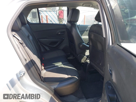 2021 Chevrolet Trax LT z VIN KL7CJPSB2MB326150, wystawiony jako IAAI lot #42019349 z przebiegiem 89 566 mil mil oraz . Historia ofert i sprzedaży dostępna na DreamBid. Obrazek 8.